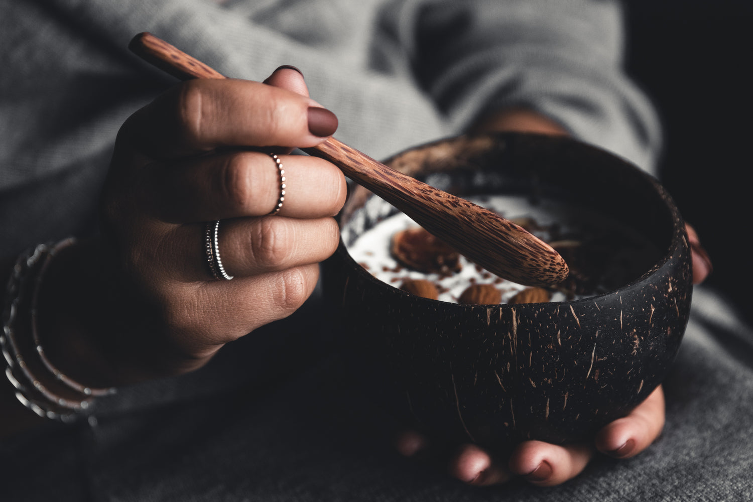 nariyal_woman_holding_coconut_bowl_breakfast